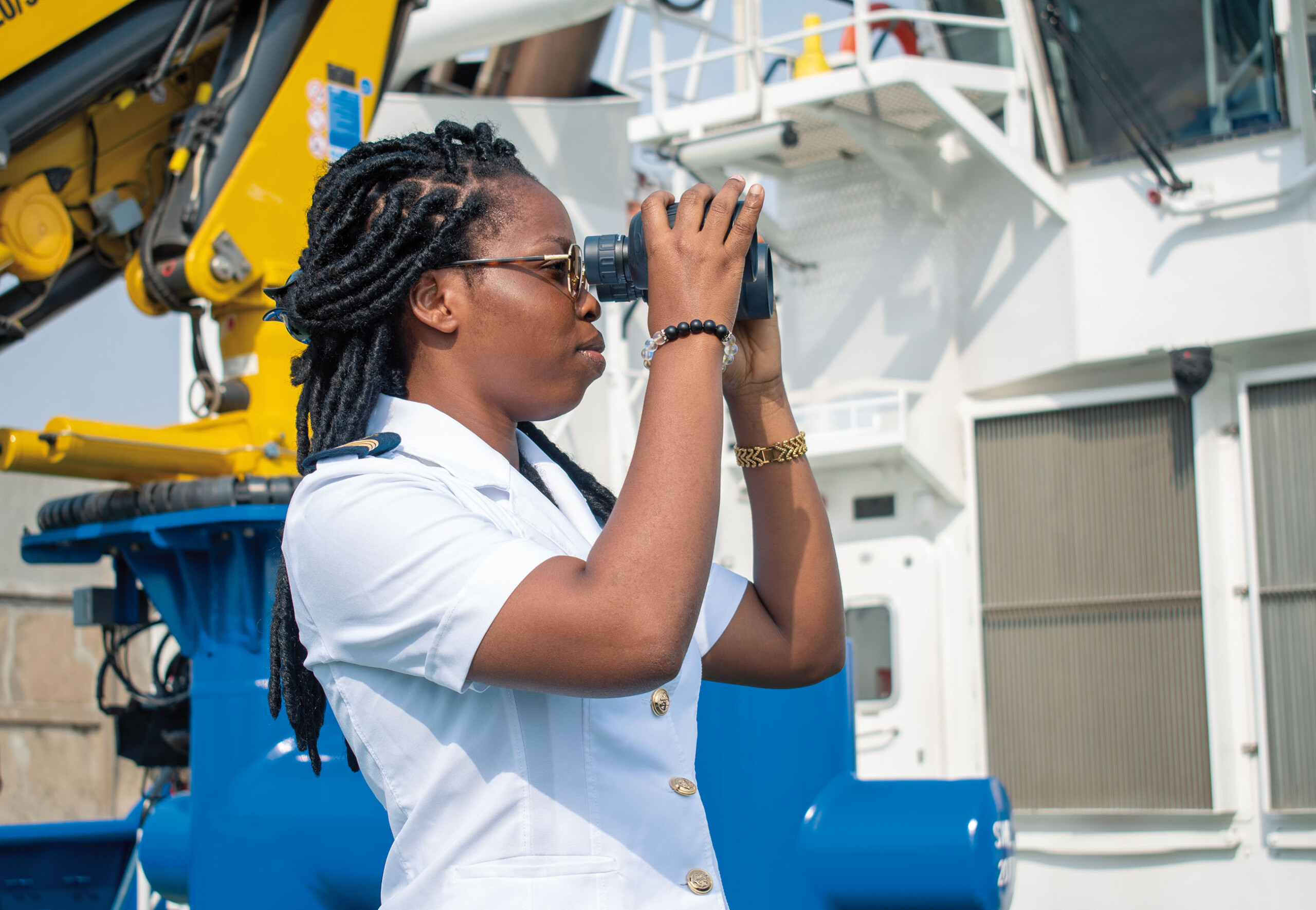 woman looking into binoculars