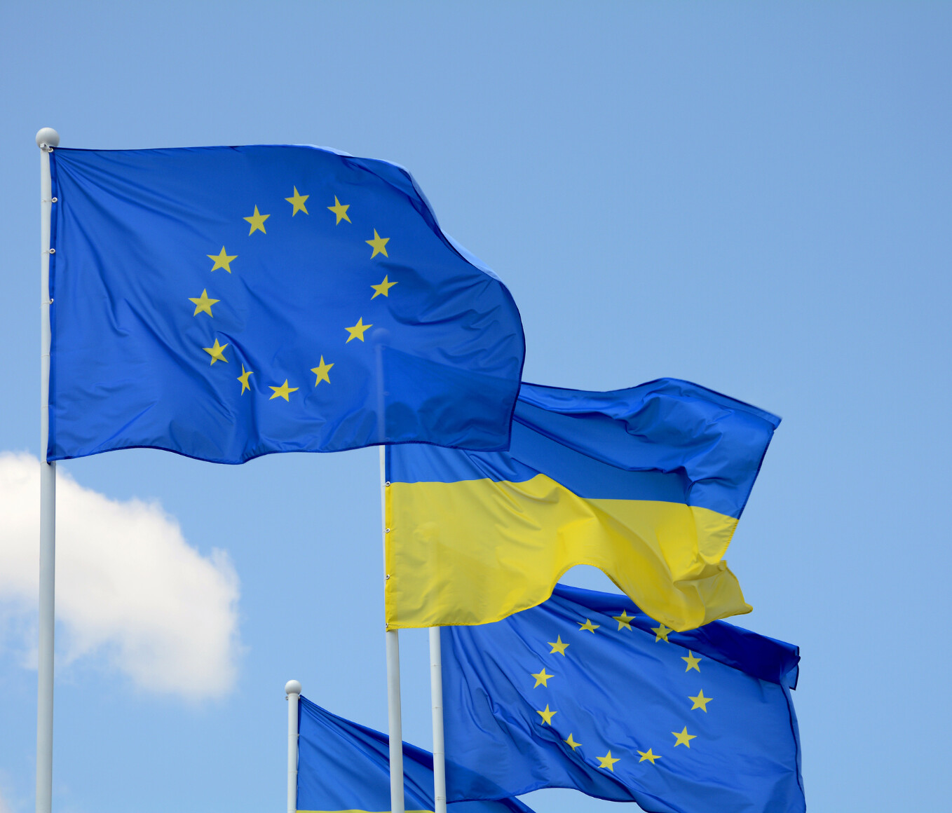 flags of the european union and ukraine flying