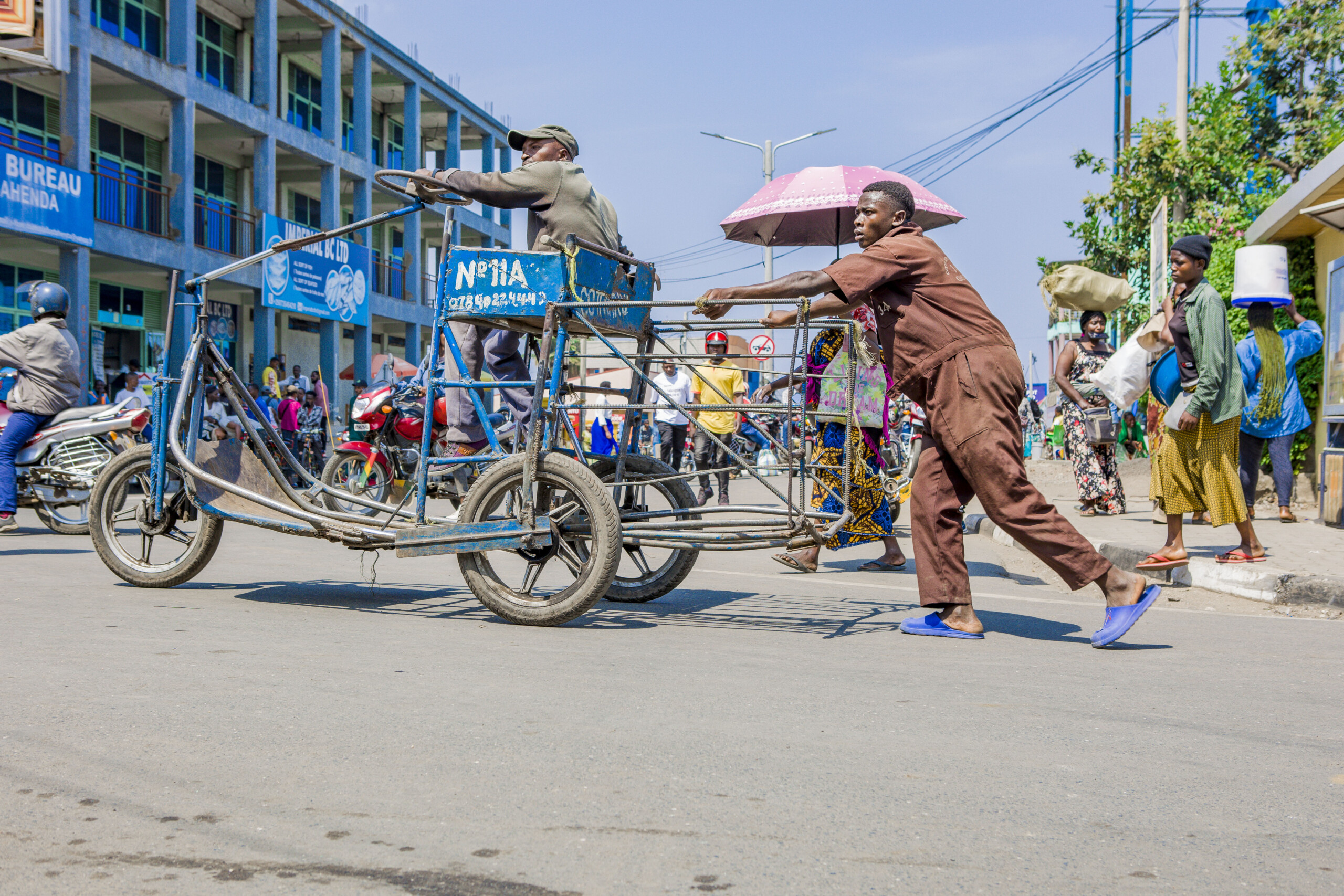 men at crossroads in Rwanda